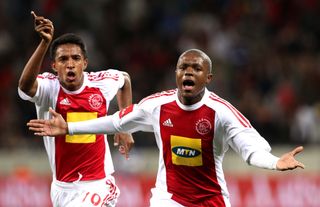 Ajax Cape Town players celebrate a goal against Bloemfontein Celtic in August 2010.