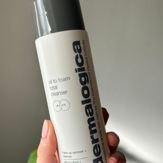 Laura holding Dermalogica Oil to Foam Total Cleanser - best cleansers