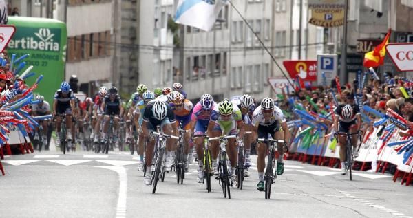 Peter Sagan (Liquigas-Cannondale) bursts to the fore in the bunch sprint.