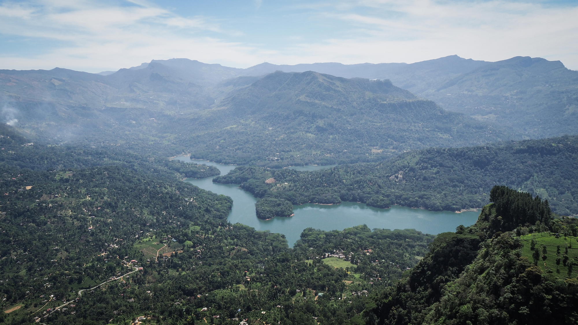 A view of a river in a valley between mountains