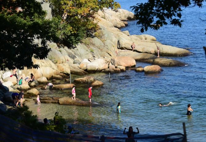 The ocean proved to be popular with the air temperature near 90 degrees