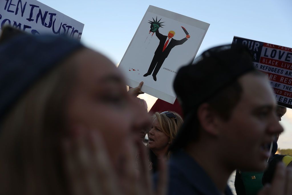 Protesters demonstrate against President Trump&amp;#039;s immigration order