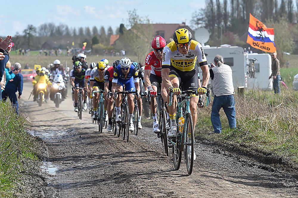 Sep Vanmarcke blasts over the muddy pave