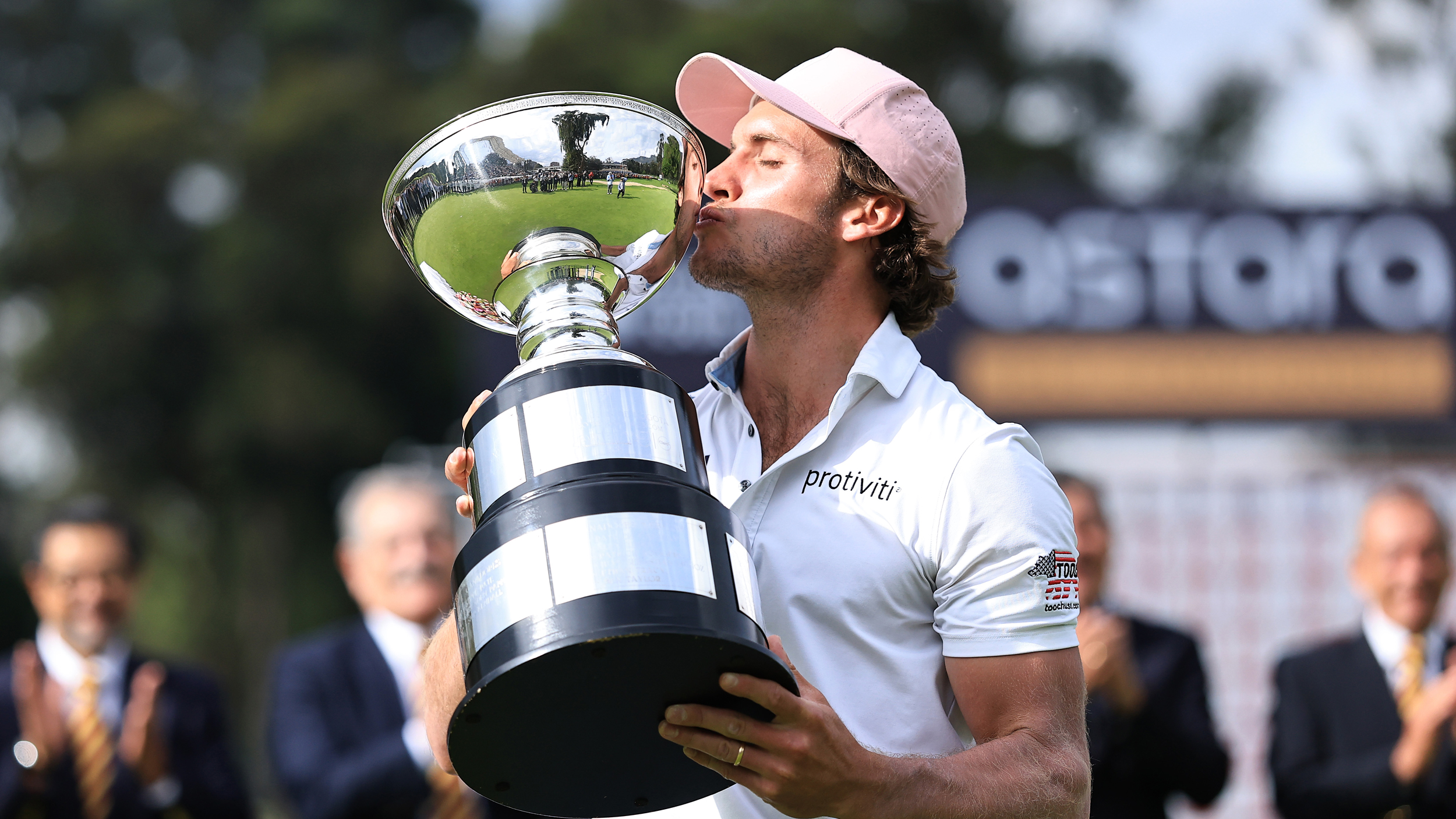 James Nicholas kisses the Astara Golf Championship trophy after winning his first Korn Ferry Tour title