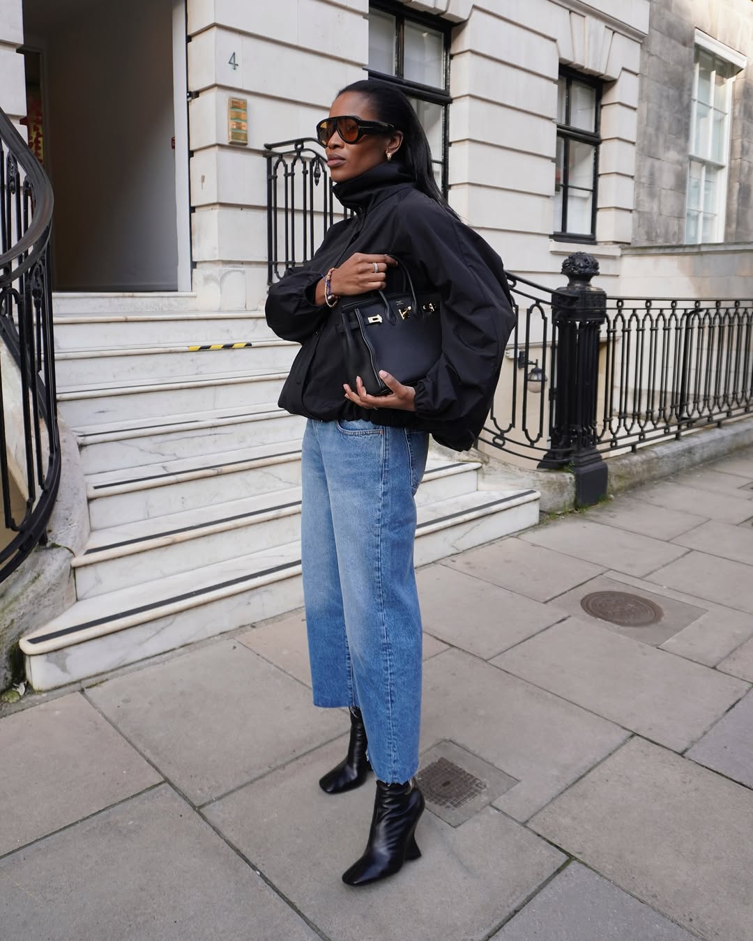 Marilyn in modern wedge boots