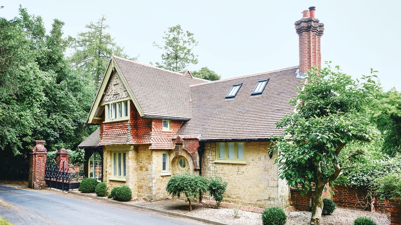 exetrior of a victorian gatehouse with vertical tiles