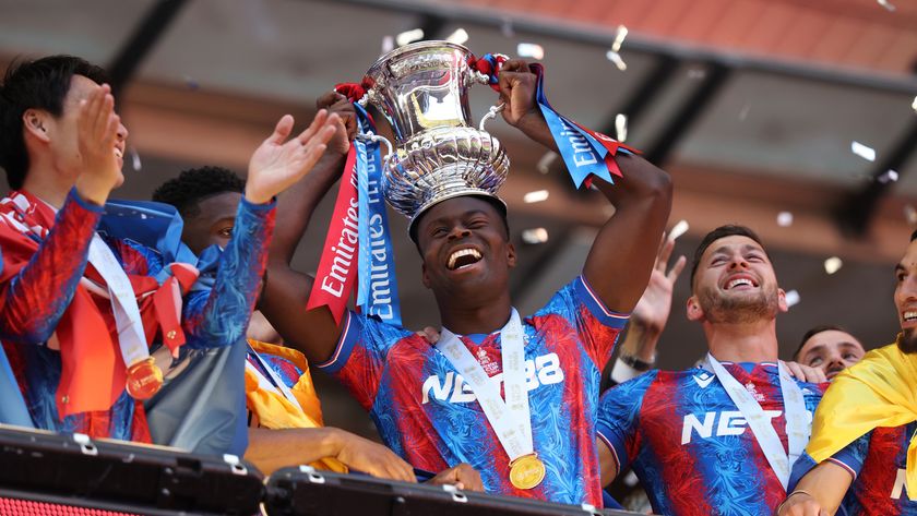 Marc Guehi of Crystal Palace celebrates with the FA Cup trophy after his team&#039;s victory in the 2025 FA Cup Final.