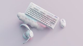 Logitech Aurora - hvidt tastatur, mus, hovedtelefoner og sky-formet håndledsstøtte
