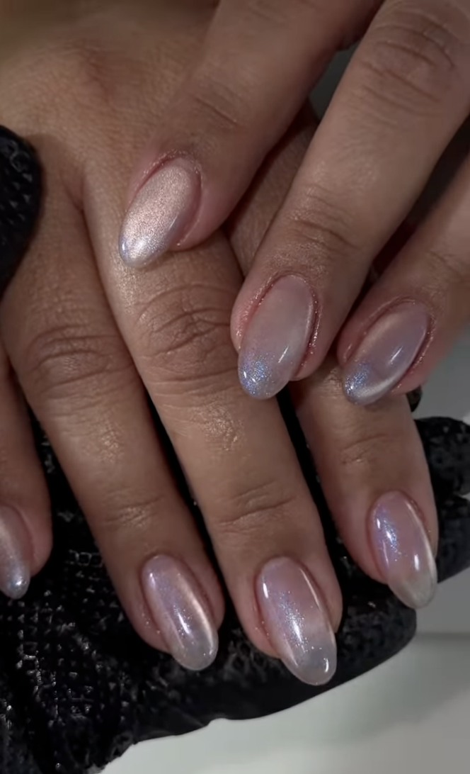 An image of light pink frosted nails.