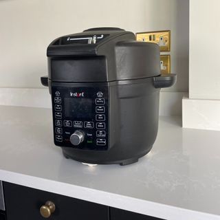 A multi-cooker on a kitchen counter
