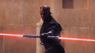 Darth Maul ignites his lightsaber in Star Wars: The Phantom Menace