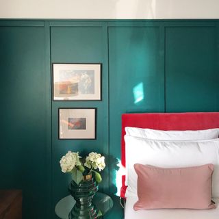 green board and batten wall in a bedroom