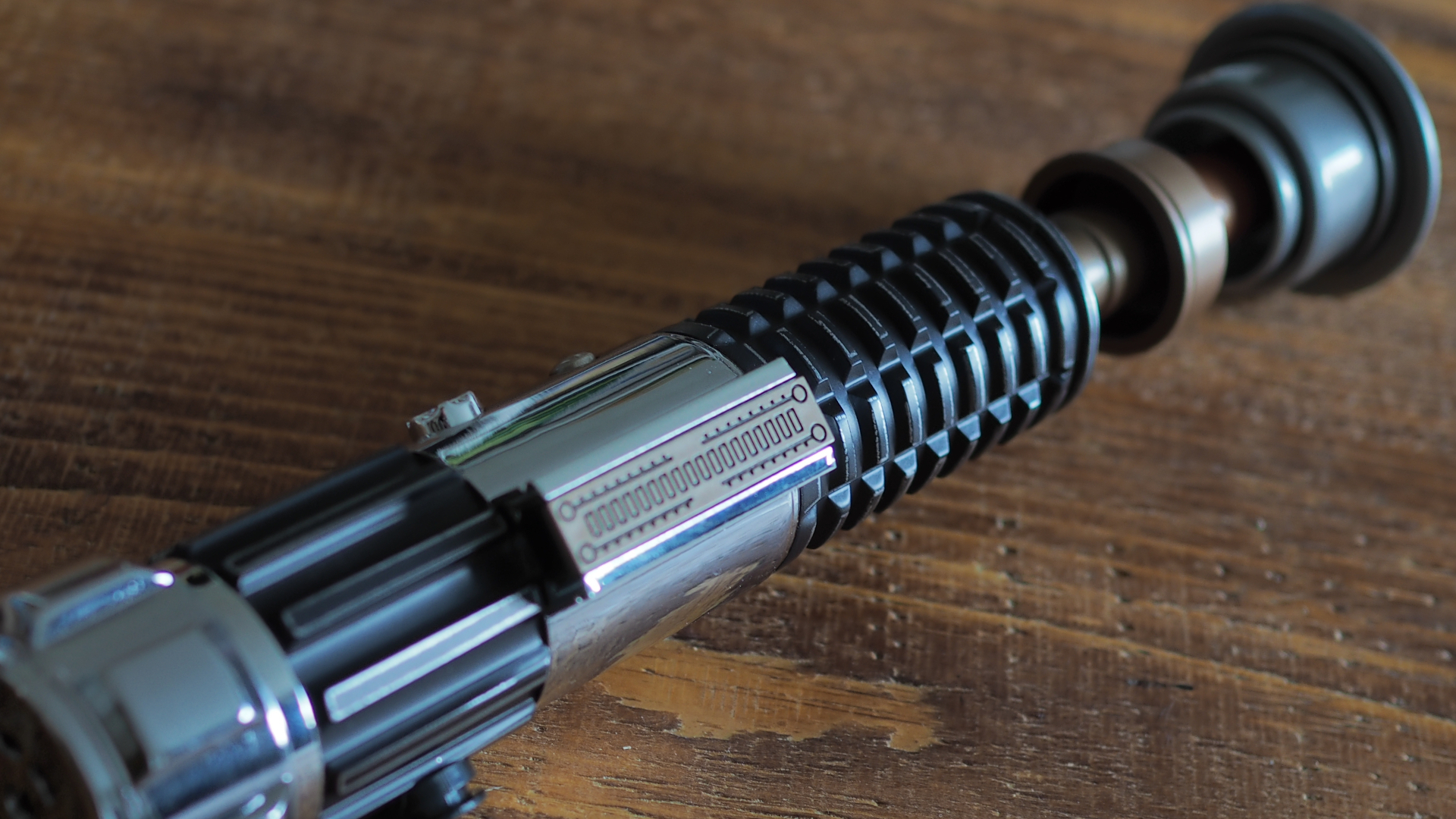 Closeup looks at the Obi-Wan Kenobi Force FX Elite Lightsaber.