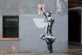 Banksy exports some British irony to the streets of America