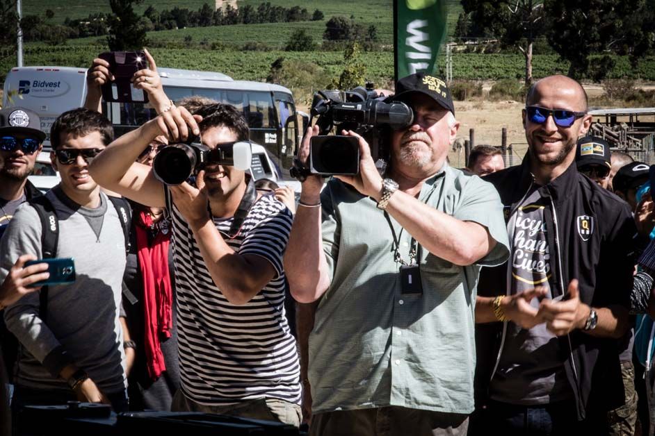 The local press turn out to see the handover