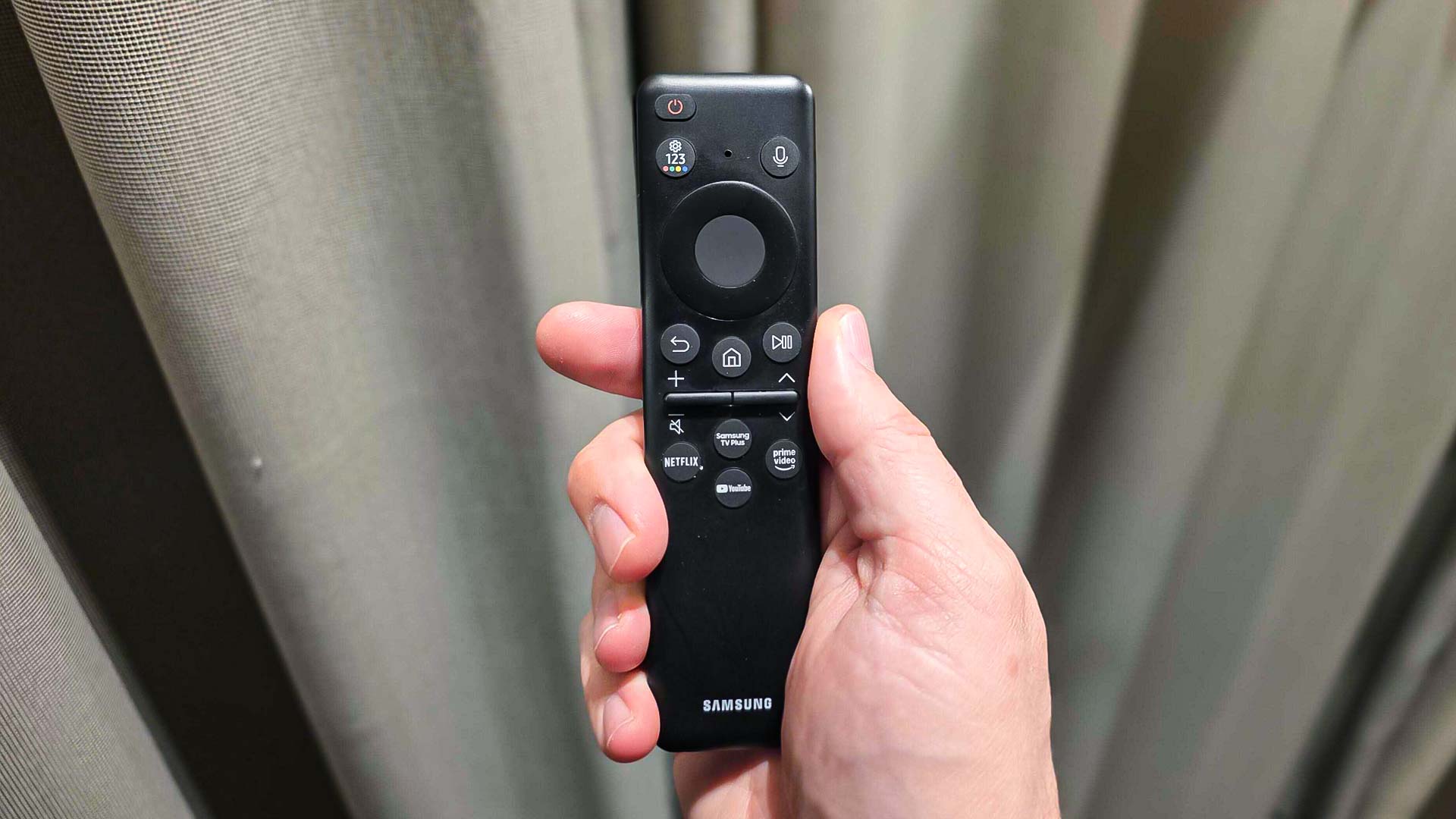 The remote for a Samsung QN990F TV.