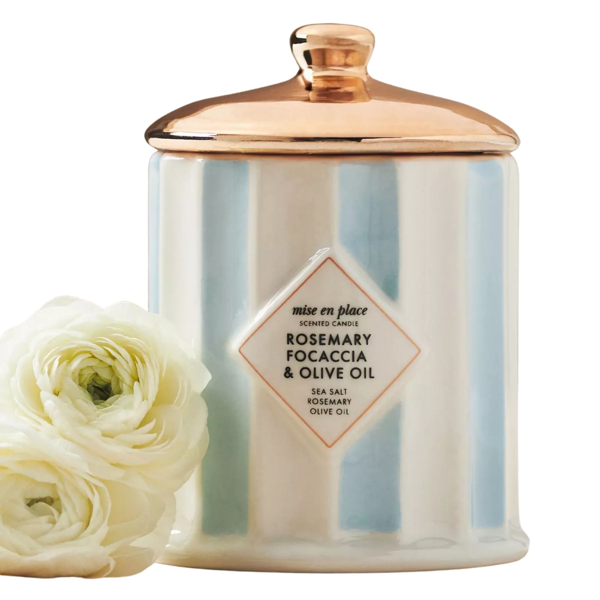Rosemary focaccia and olive oil candle in a blue and white ceramic vessel with rose gold lid