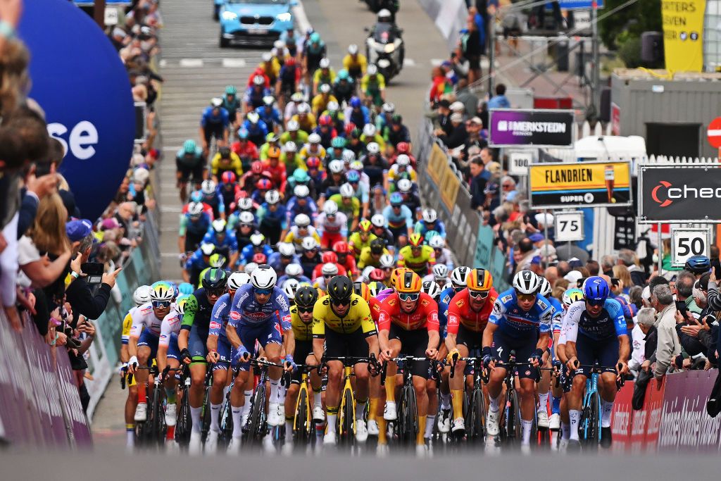 KNOKKEHEIST BELGIUM JUNE 13 A general view of Gianni Vermeersch of Belgium Quinten Hermans of Belgium and Team Alpecin Deceuninck Edoardo Affini of Italy and Team Team Visma Lease a Bike Erik Nordsaeter Resell of Norway and Team UnoX Mobility Pepijn Reinderink of The Netherlands and Team Soudal QuickStep Tom Van Asbroeck of Belgium and Team Israel Premier Tech and the peloton competing during the 93rd Baloise Belgium Tour 2024 Stage 2 a 1842km stage from Merelbeke to KnokkeHeist on June 13 2024 in KnokkeHeist Belgium Photo by Luc ClaessenGetty Images