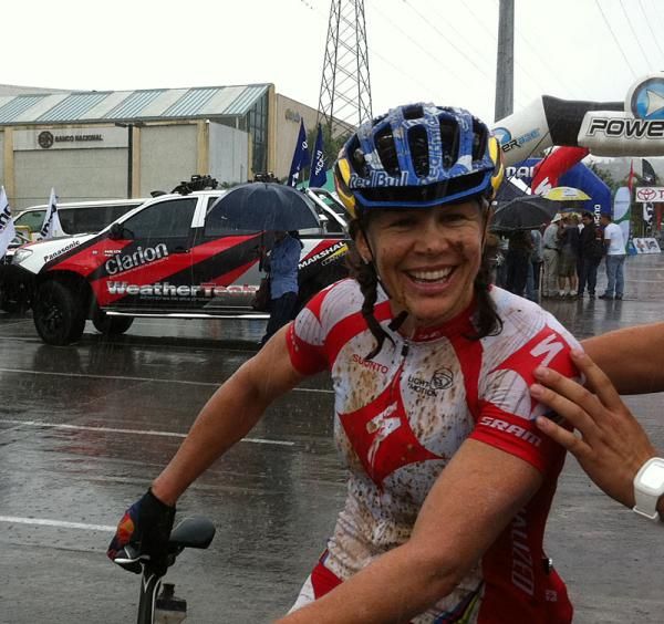 Rebecca Rusch (Specialized) finished in the pouring rain