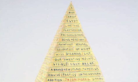 Word written on a pyramid type of structure.