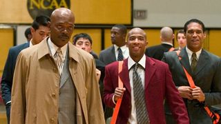 Samuel L. Jackson as high school basketball coach Ken Carter walks in a gymnasium in Coach Carter
