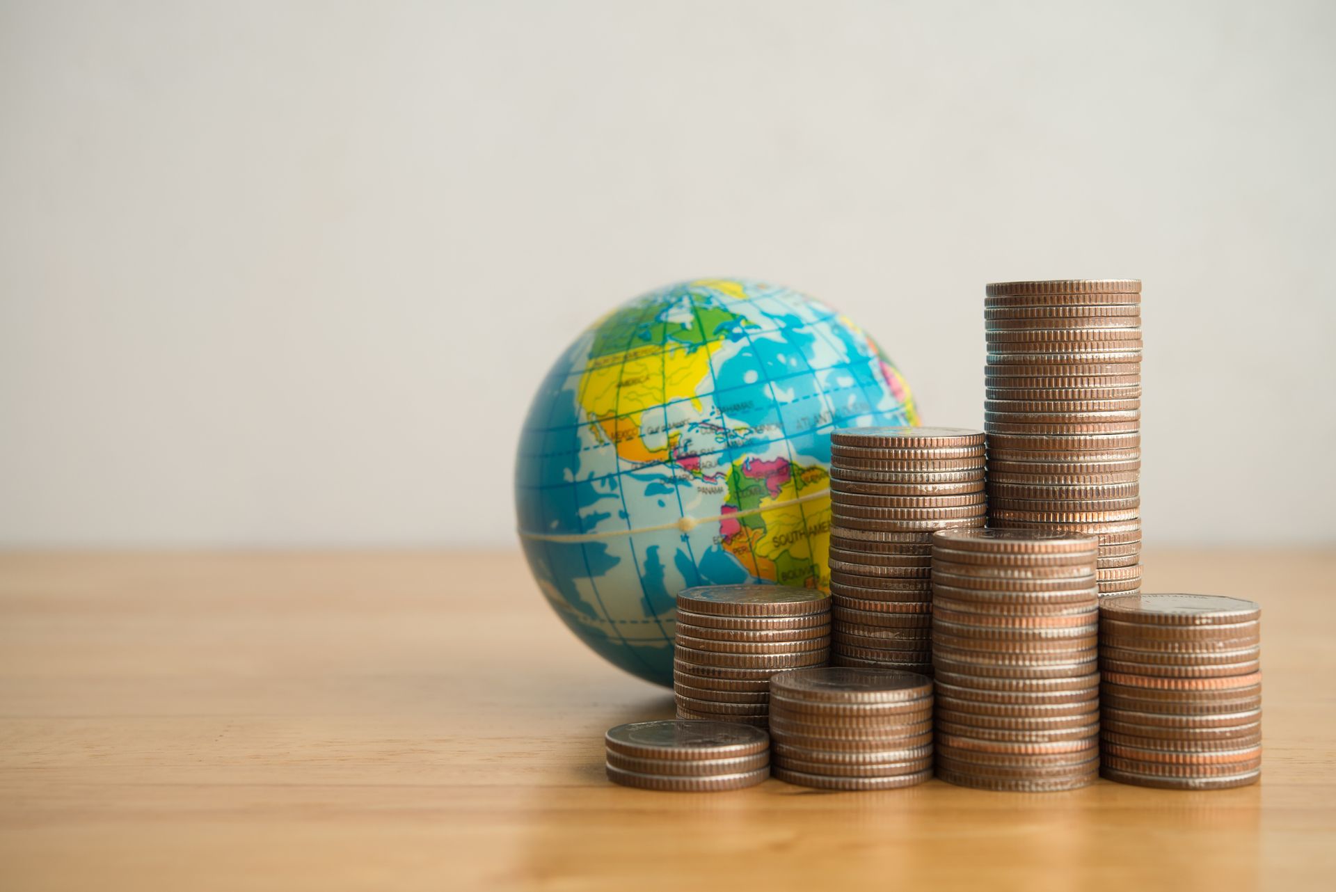 coins globe investment bonds around the world