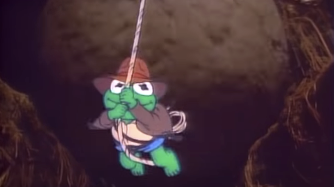 Kermit schwingt sich im Muppet Babies-Intro vom Felsblock weg
