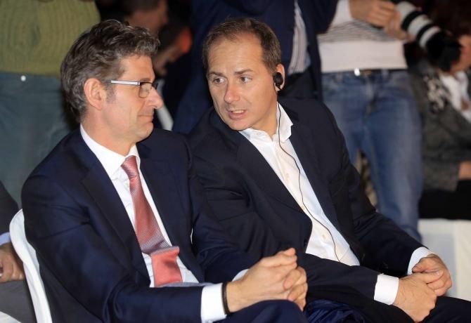 Giro d'Italia director Michele Acquarone chats with Katusha directeur sportif Valerio Piva.