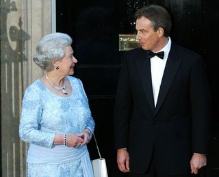 The Queen (left) with Tony Blair (right)