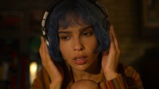 Zoe Kravitz in Kimi 2022 movie listening with headphones