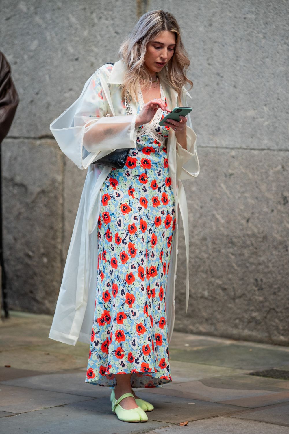 street style shot of woman wearing floral rixo dress