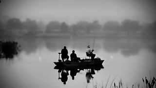 Fishing on a pond in Florida in black and white