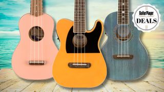 Three ukuleles on a beach