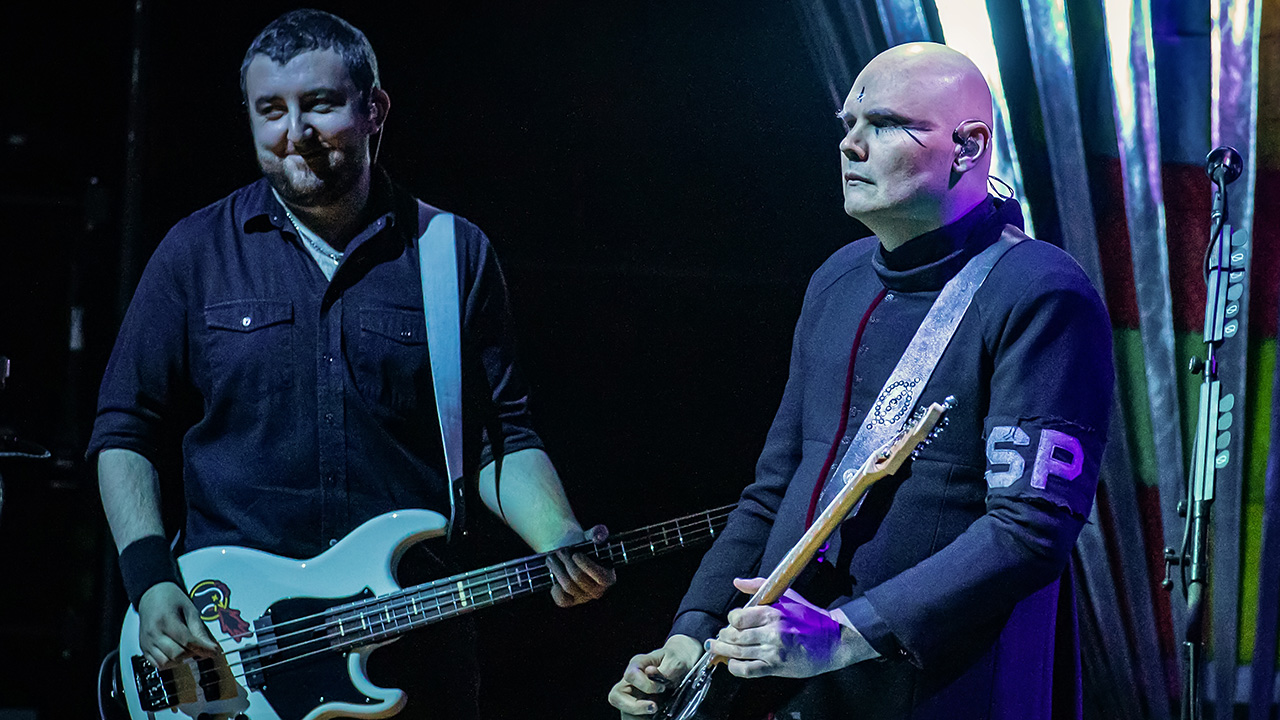 Jack Bates (left) performs with the Smashing Pumpkins