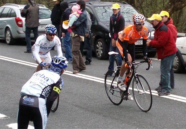 Local fans cheer on the break away riders.