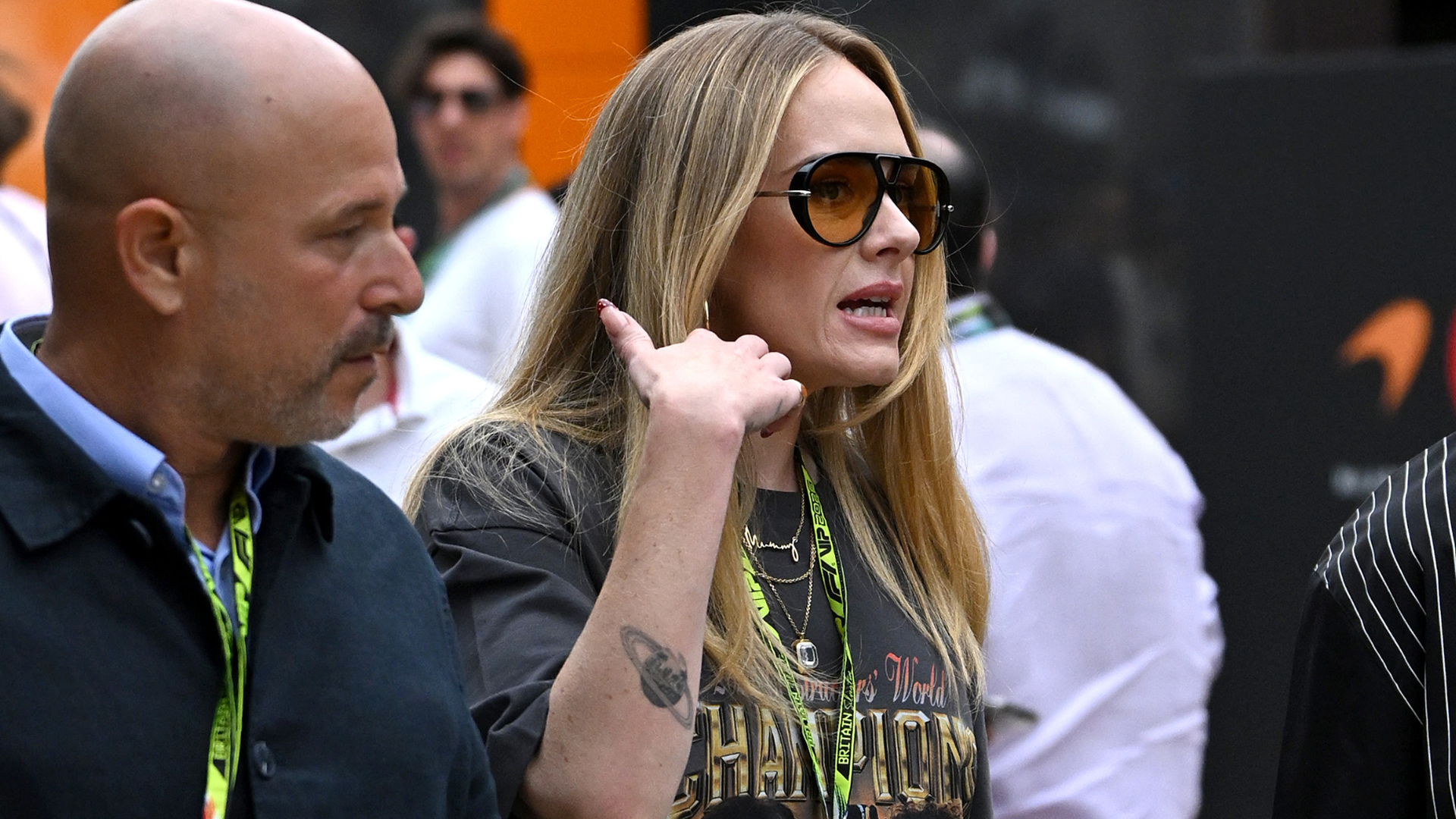 Adele arrived at the Formula 1 British Grand Prix in the graphic tee trend and flip-flops