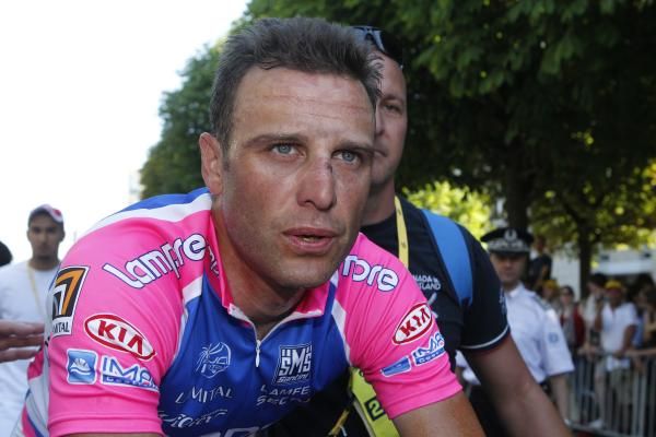 Alessandro Petacchi (Lampre-Farnese Vini) heads to the podium, everyone heads to the buses