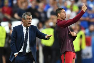 Portugal coach Fernando Santos and captain Cristiano Ronaldo give instructions during the Euro 2016 final against France.