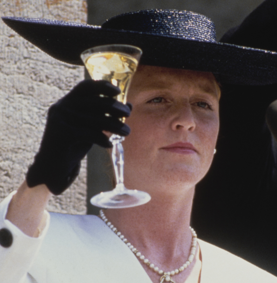 Sarah Ferguson lifting a glass of wine