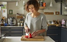 Woman preparing meals for a 4 week weight loss plan
