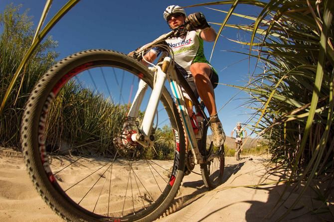 Riders battled their way through deep soft sand
