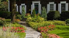 front yard with path and flowerbeds