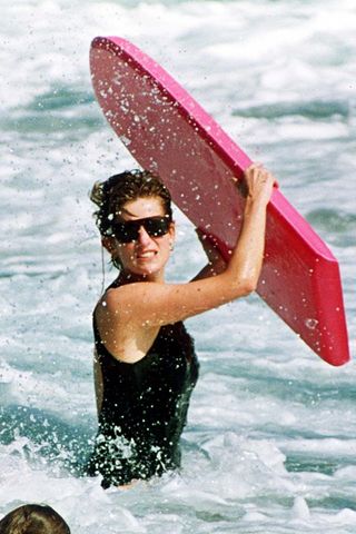 Princess Diana swimming and surfing in the sea