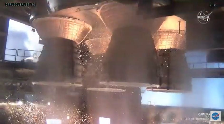 NASA's first Space Launch System megarocket test fires its four main RS-25 engines in a critical hot fire test at the Stennis Space Center near Bay St. Louis, Mississippi on March 18, 2021. The booster will launch NASA's Artemis 1 mission around the moon in late 2021.