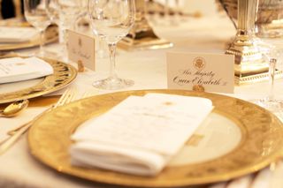 A table setting is shown during a press preview of the State dinner for Queen Elizabeth II of England and her husband Prince Philip 07 May 2006