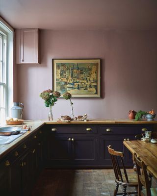 pink kicthen with green cabinets painted in Sulking room pink by Farrow and Ball pink paint color