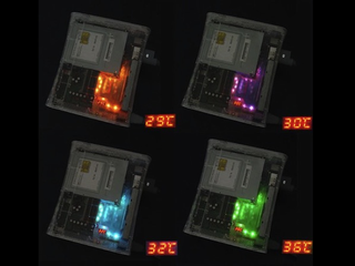 An Xbox 360 with a Thermometer