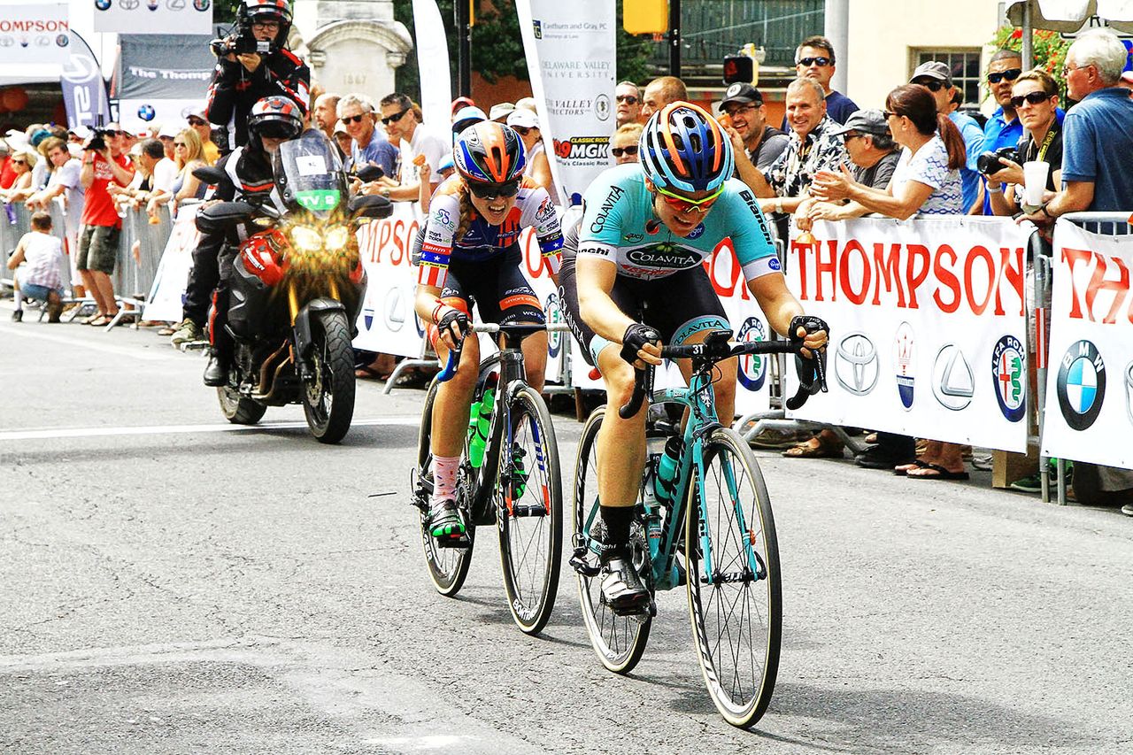 Skyler Schneider (ISCorp p/b Smart Choice MRI) holds tight on Gretchen Stumhofer&rsquo;s (Colavita/Bianchi) wheel, waiting to pounce at the line