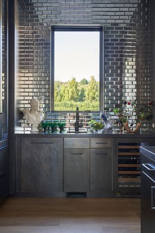 Pantry with mirrored tiles