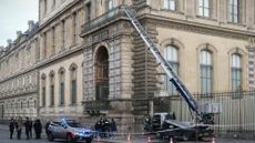 Paris police inspect bucket elevator used to look royal jewels from the Louvre